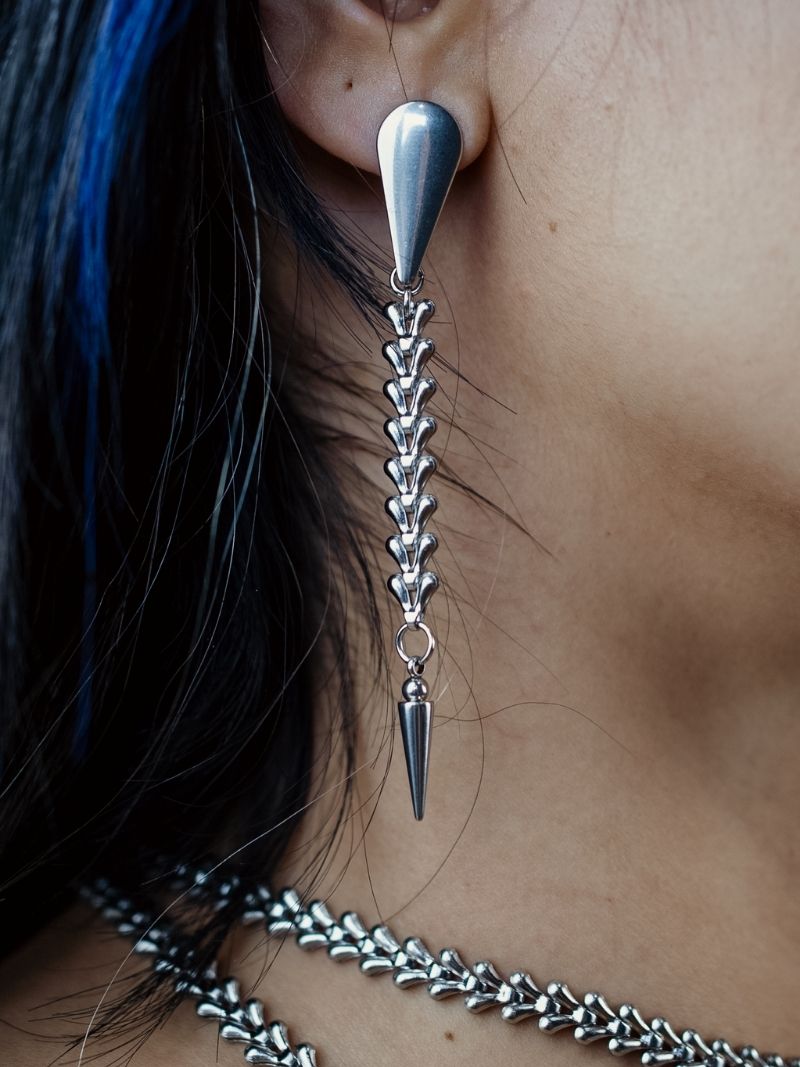 SKELETAL vertebrae stud earrings