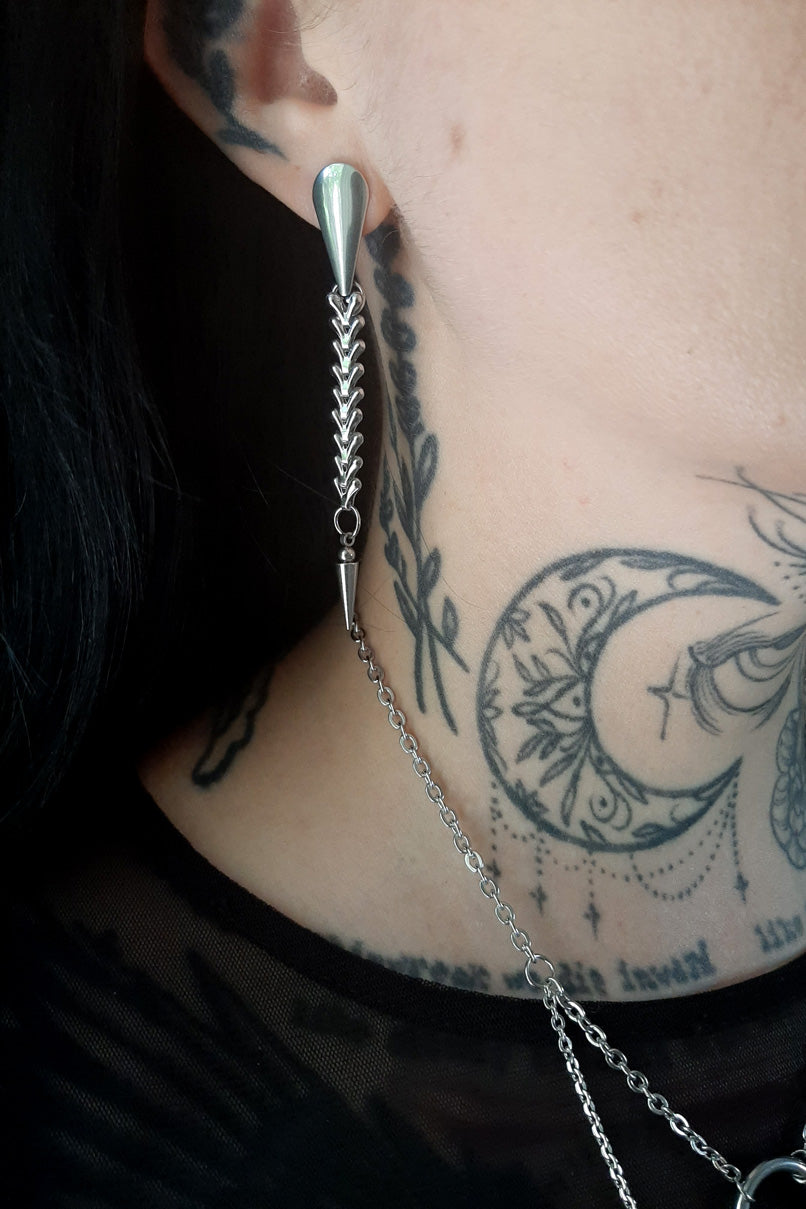 SKELETAL vertebrae stud earrings