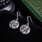 SERPENTINE Snake medallion earrings