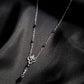 WHISPER rosary necklace