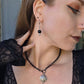 Crystal ball clicker earrings