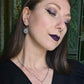 SERPENTINE Snake medallion earrings