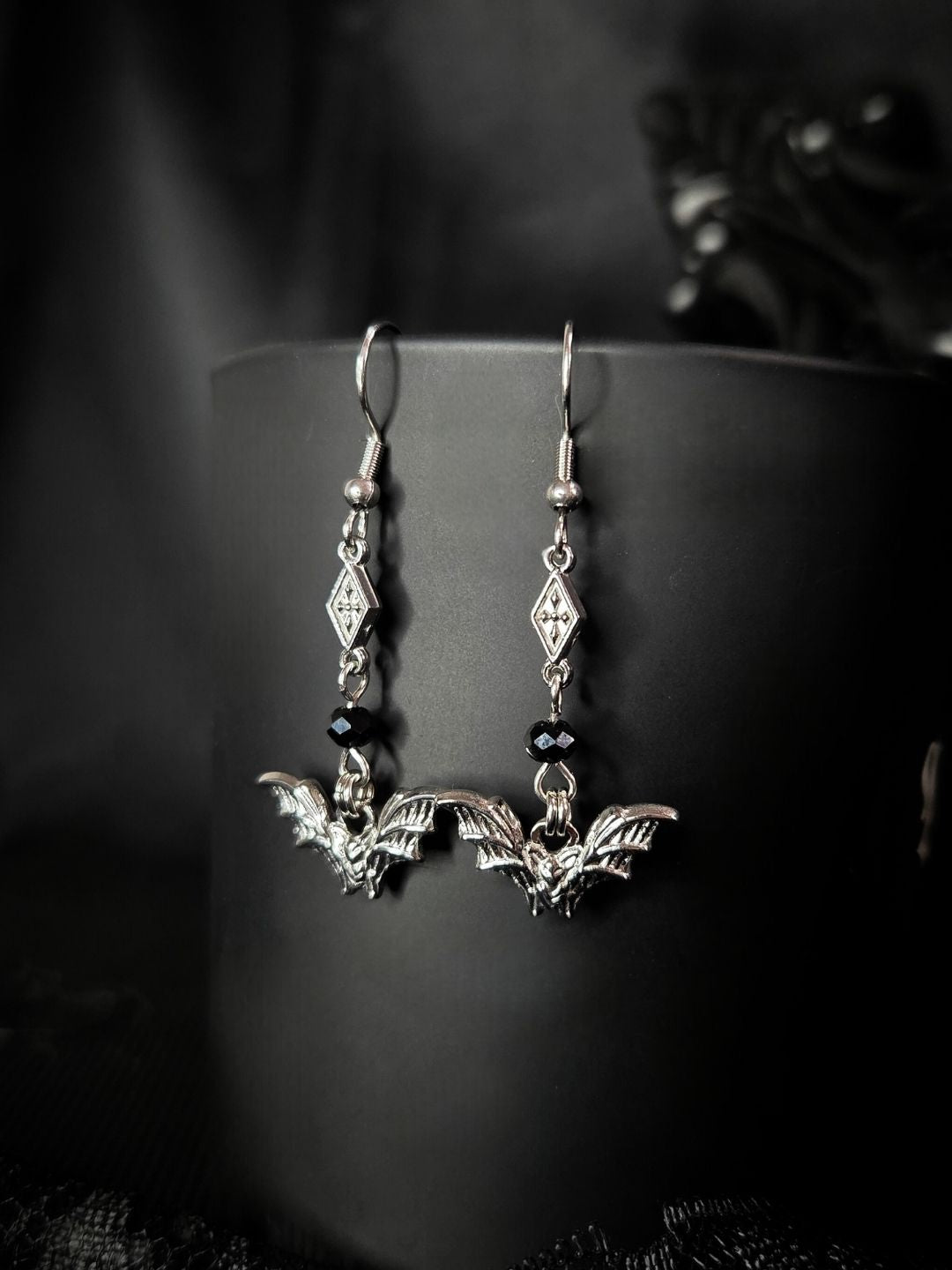 NOCTIS bat earrings