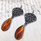 Black filigree orange earrings