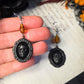 Black skull cameo earrings