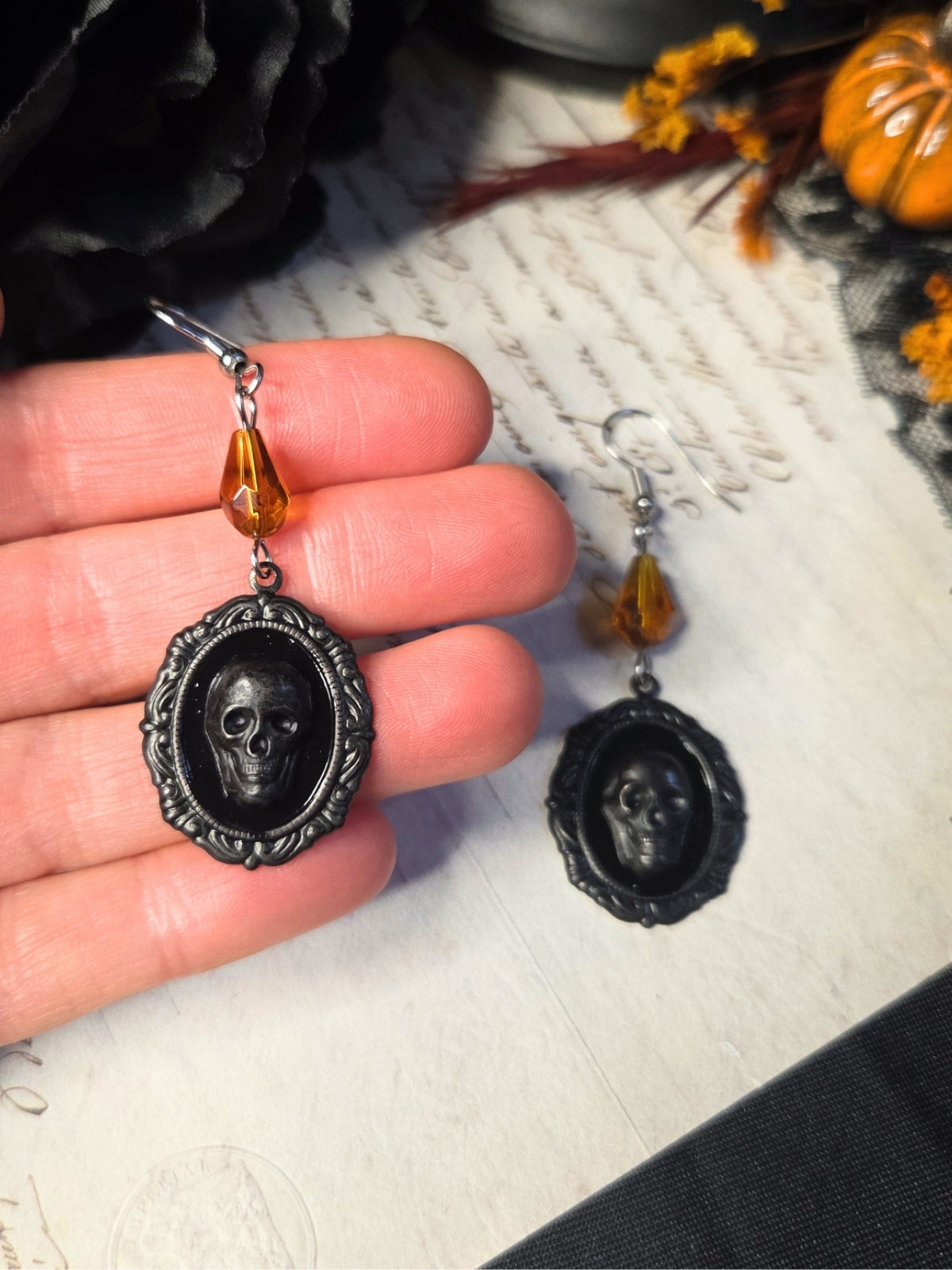 Black skull cameo earrings