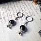 Crystal ball clicker earrings