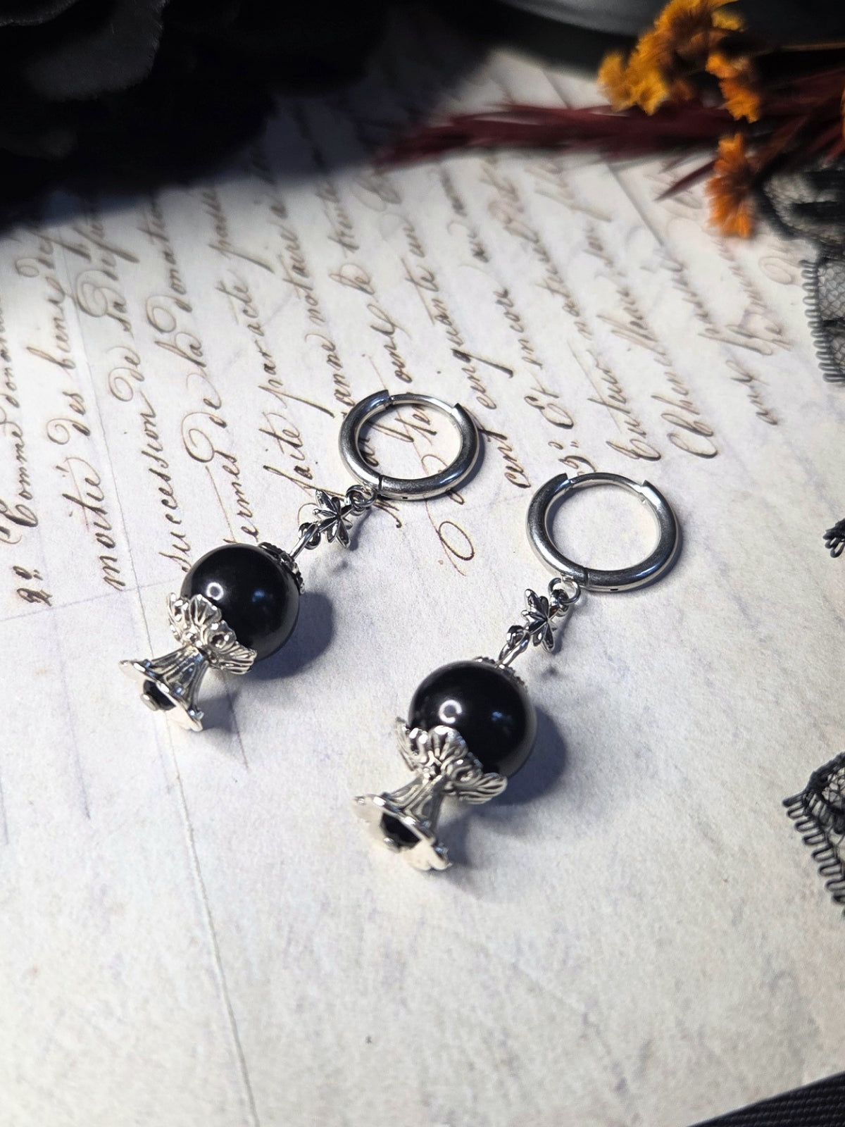 Crystal ball clicker earrings
