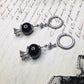 Crystal ball clicker earrings