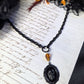 Black skull cameo necklace