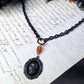 Black skull cameo necklace