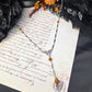 Filigree orange rosary necklace