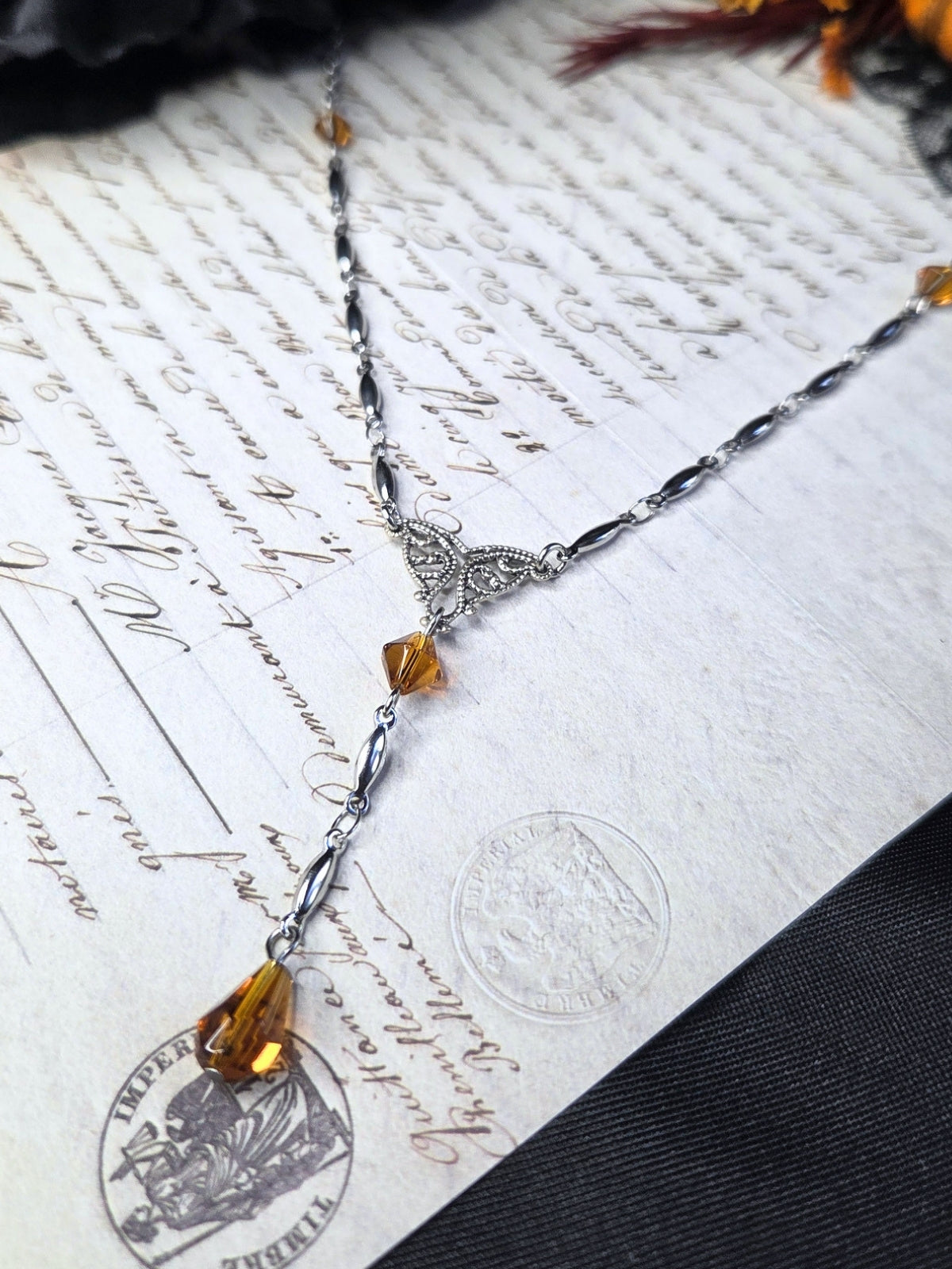 Filigree orange rosary necklace