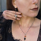 Purple black bat earrings