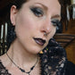SOLACE mourning hand necklace