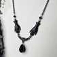 SOLACE mourning hand necklace
