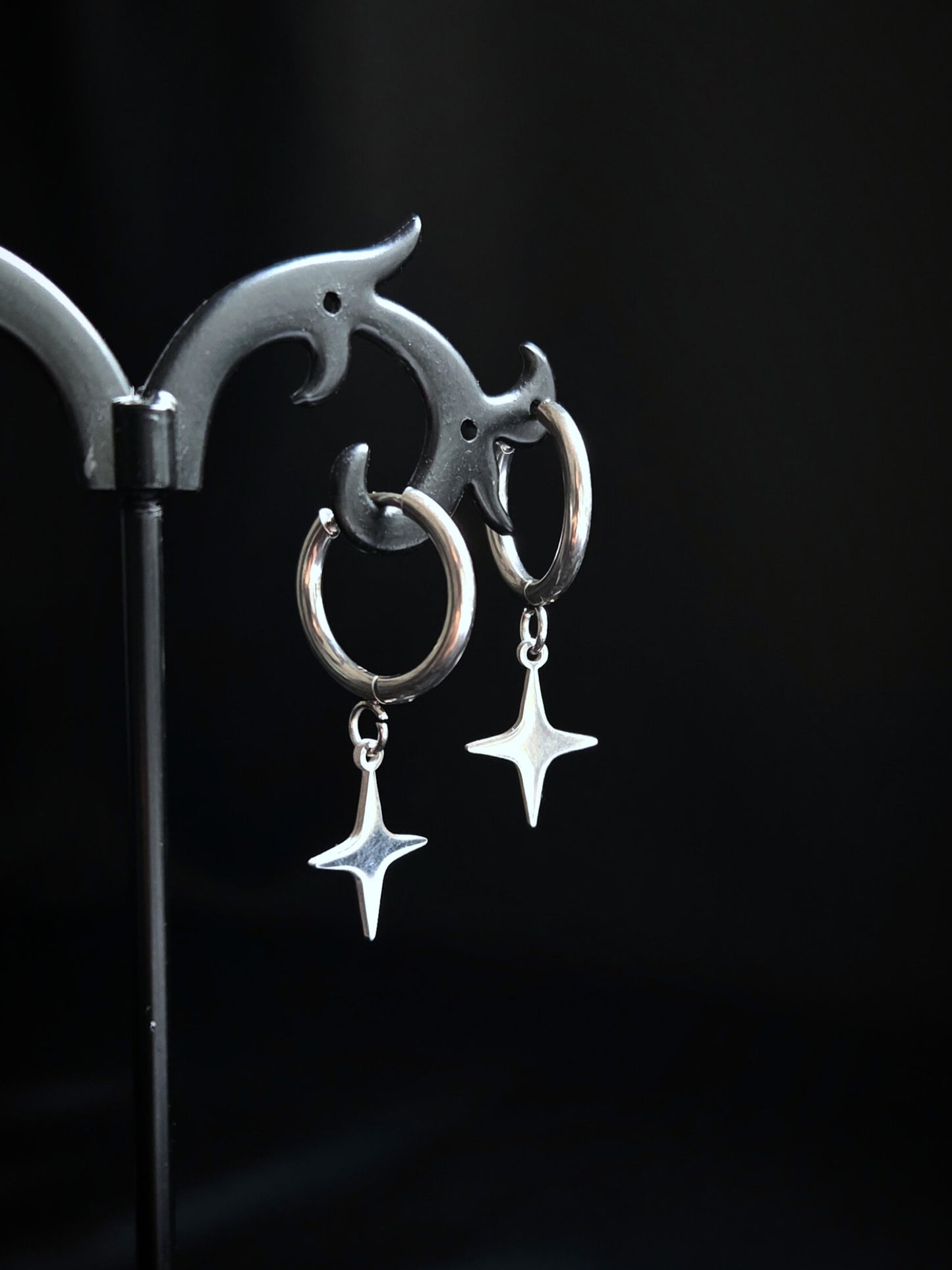 Spark stainless star clicker earrings