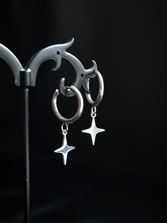 Spark stainless star clicker earrings