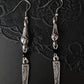 Silver black spike architectural earrings