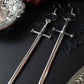Silver sword long earrings