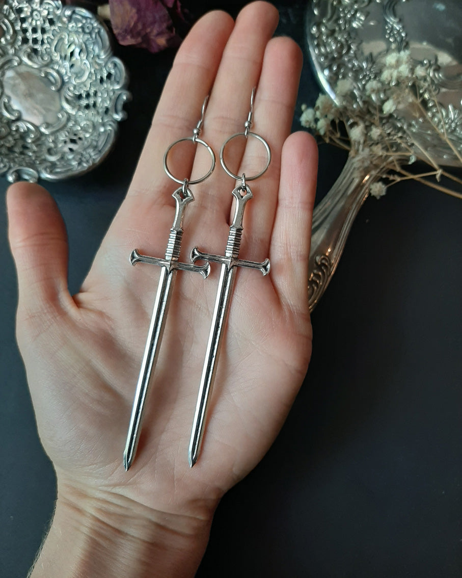 Silver sword long earrings